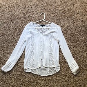 An elegant white button down blouse